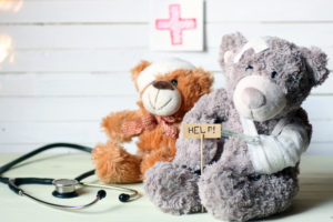 bandaged injured teddy bears